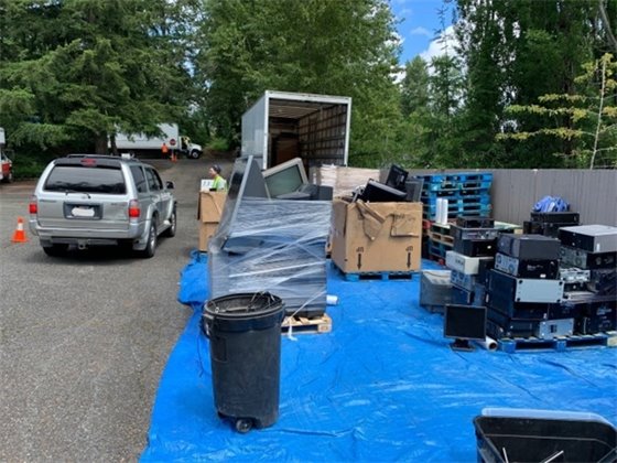 Car dropping off recyclables at last year's event