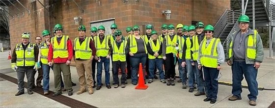 CERT volunteers in hard hats and yellow vests
