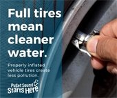Full tires mean cleaner water - person adding air to a tire