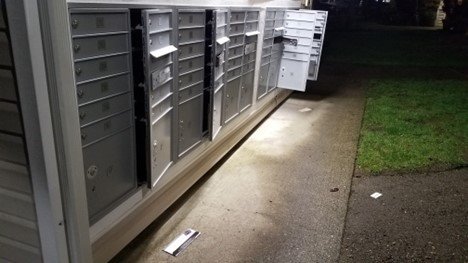 Bank of multifamily mailboxes that were broken into