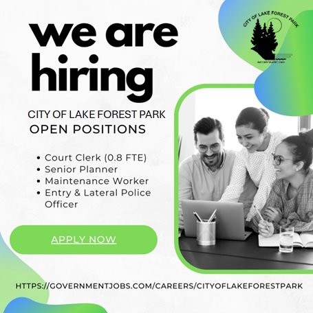 We are hiring - employees looking at a computer