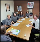 Youth Court members sitting at table