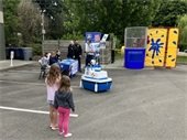 Visitors at Safety Day with dunk tank in the background